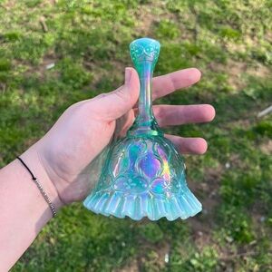collectible Fenton Art Glass bell featuring an iridescent Spanish Lace pattern